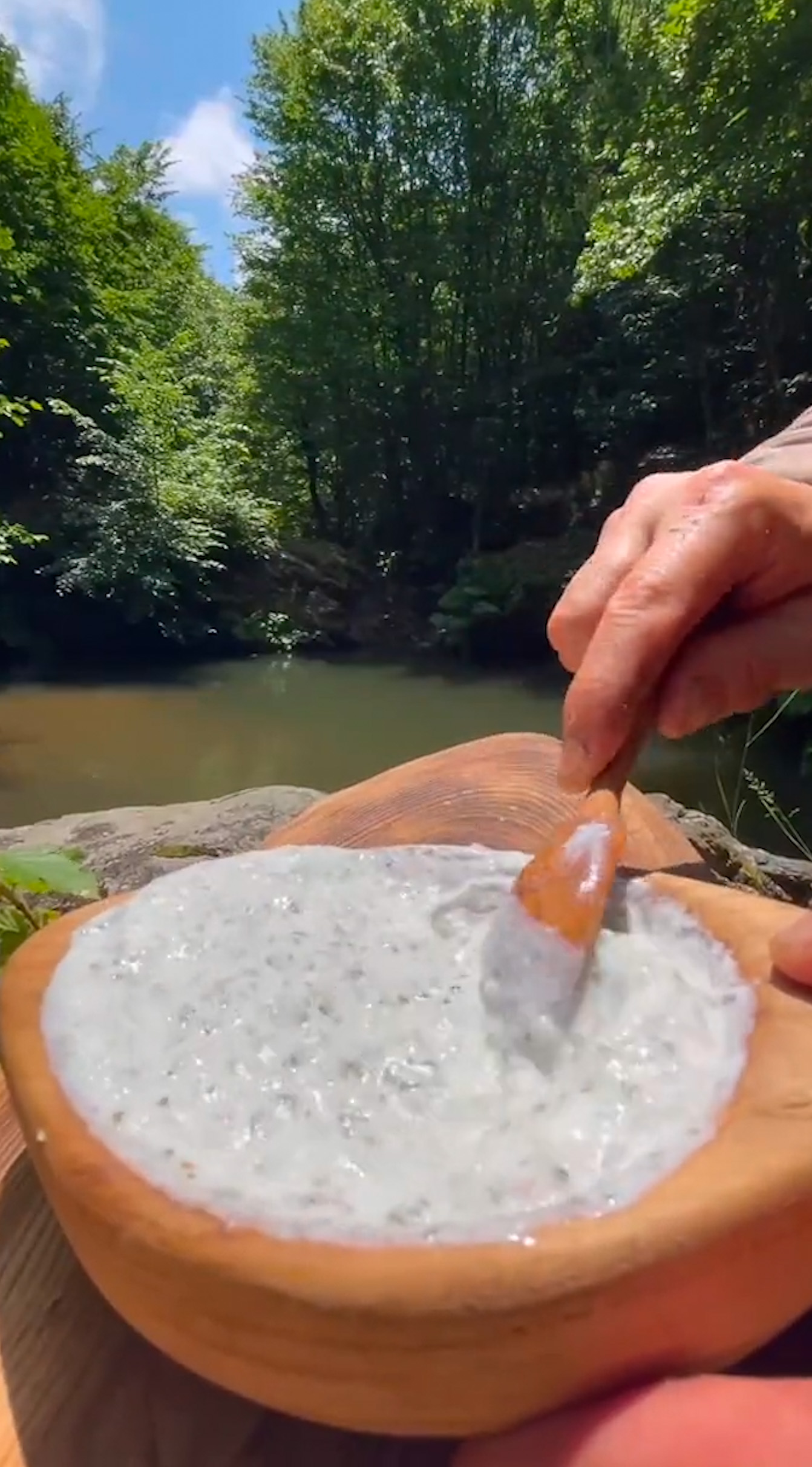 camping cooking on a stone